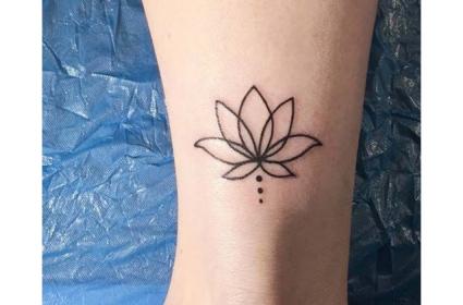 Unlock the Symbolic Power: Lotus Flower Semicolon Tattoo Meaning
